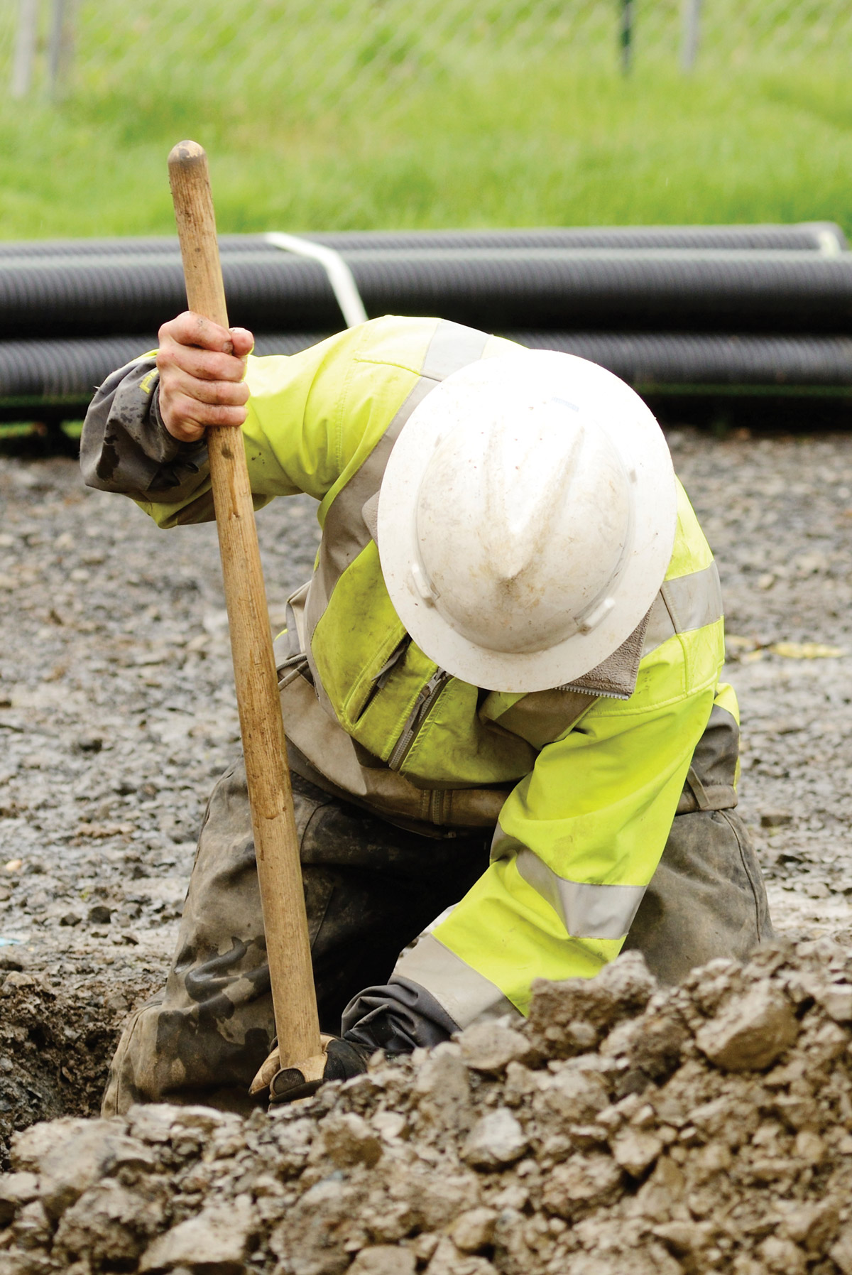 Contractor hand digging