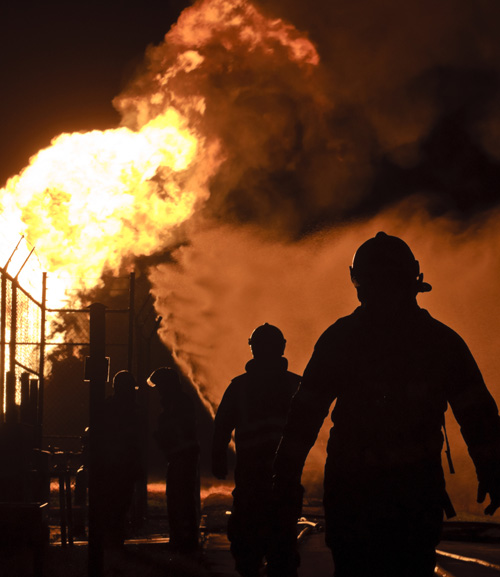 Firemen responding to gas fire